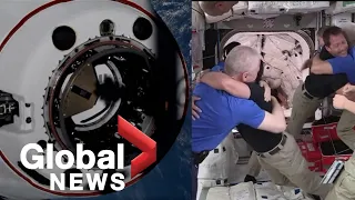 SpaceX crew gets warm welcome aboard Space Station after docking