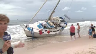 Mystery sailboat washes ashore in Fort Morgan,