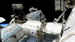 NASA astronauts conduct spacewalk to upgrade ISS