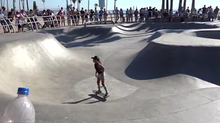 Young Skateboarding Girl Sky brown @ Venice Beach Skatepark