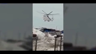 Terrifying moment Mi 26 helicopter crashes and breaks apart