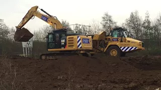 PLANT HIRE: Cat 320 excavator loading into a Cat 730 dump truck