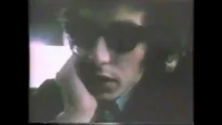 John Lennon needling a nauseous Bob Dylan