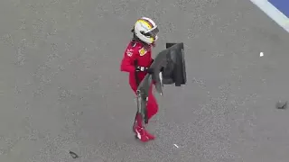 Vettel get up the front wing his car after crash | Russian GP | Sochi Formula 1