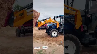 Descargando paquetes de heno con tractor Lovol 504