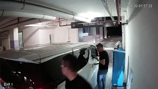 Rude BMW driver breaks the parking barrier gate