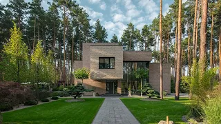 Modern Brick Exterior House Set In A Beautiful Landscape