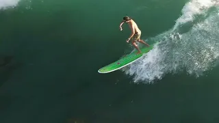 LONGBOARD SURFING AT HAWAII SURF BREAK PUBLIC