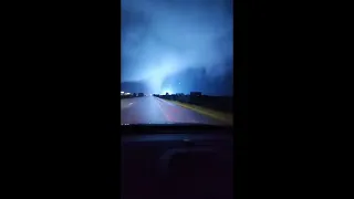 Driver Narrowly Misses Flying Debris as Tornado Hits Marietta