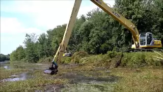 Long Reach Excavator Dredging Canal