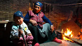 Life in a village in the Himalayas. Evening in an ordinary Nepalese family in the mountains