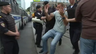 More than 400 arrested, including opposition leader Navalny, at Moscow march | AFP