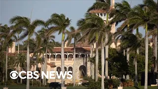 What led to the FBI search warrant at Mar-a-Lago?