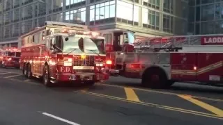 FDNY RESCUE 1, DOING A UEY, WHILE RESPONDING FROM A 10-77 HIGH RISE FIRE TO ANOTHER CALL IN NYC.