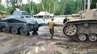 The Sd.Kfz.231 (8 Rad) pushes the Stug