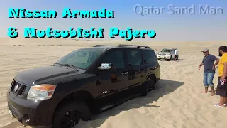 Nissan Armada and Mitsubishi Pajero stuck, in the Qatar desert, the inland sea.  سيلين , العديد