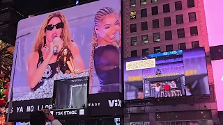 Shakira performing  live in Times Square in NYC