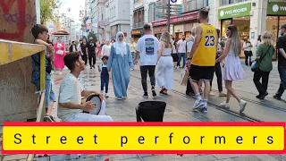 people passing by taksim street and sercan