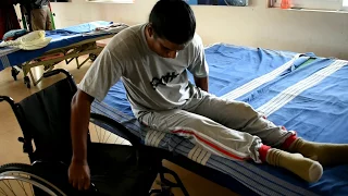 spinal injured person C6 C7 bed to wheelchair Transfer