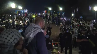 Police march through group of UCLA pro-Palestinian protesters but quickly leave