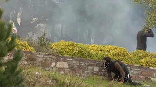 Protesters clash with police outside a barracks in Corsica