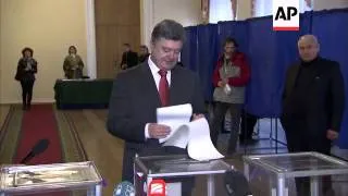 President Poroshenko casts his ballot as Ukrainians head to polls to elect a new parliament