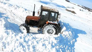 Испытываем самодельный отвал для МТЗ 82. ДТ 75 против мокрого снега! Homemade pusher for a tractor.
