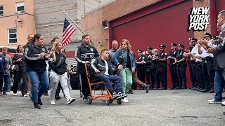 NYPD cops allegedly shot by migrants given guard of honor after leaving hospital
