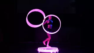 Girl Performs with LED Hula Hoops