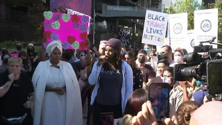 LGBTQ activists rally outside Netflix HQ as transgender employees walk out | AFP