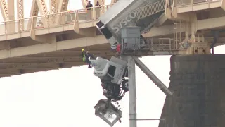 Dramatic rescue shows semi dangling over Kentucky bridge