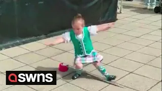 Determined highland dancer who falls over gets straight back up and carries on | SWNS