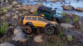 FMS FCX18 LC80 VS TRX4M DEFENDER 90 2 ICONIC OFF ROAD MACHINES GO AT IT (COMPARISON TEST) WHO WINS ?