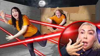 ESCAPING JAIL THROUGH 100 LAYERS OF CARDBOARD AND LASERS!