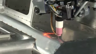 Motoman TIG welding robot with MotoSense vision system