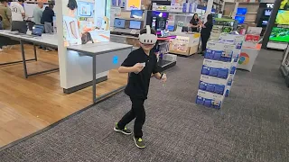 My son trying out the Meta Quest 3 at Best Buy