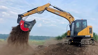 Top soil roaring out of the Difco All-Star Screening Bucket on Sany Excavator