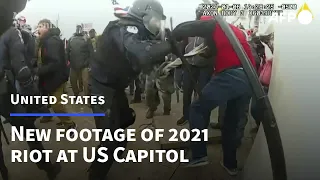 US Capitol probe shows graphic new footage of 2021 riot | AFP