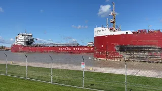 Great Lakes Freighters Whitefish Bay and Baie Comeau each with a salute in the Soo Lock Canal