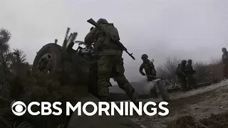 Ukrainian and Russian troops battle just feet apart