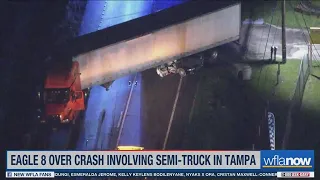 Semi-truck crumples car in Tampa crash