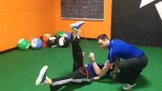 Functional Integrated Training: Resistance Band Passive Leg Lowering Exercise