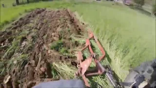 Plowing A Hillside