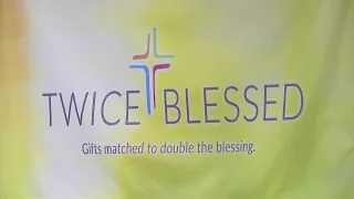 Twice Blessed giving out checks
