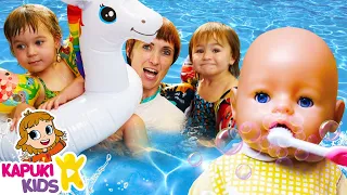 Baby doll morning routine & feeding baby doll - Swimming pool & Family fun video for kids.