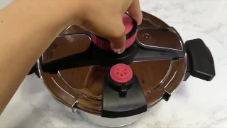 one touch pressure cooker opening and closing