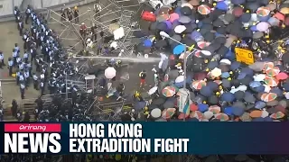 Hong Kong police declare China extradition protest 'a riot' as rubber bullets ...