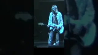 Kurt Cobain receives an electric shock from the microphone