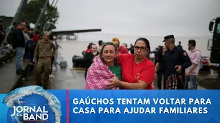 Gaúchos tentam voltar para casa para ajudar familiares | Jornal da Band