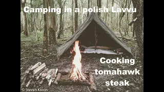 Camping in a Dutch forest, in a Polish lavvu, making fire, cook a tomahawk steak, making table.